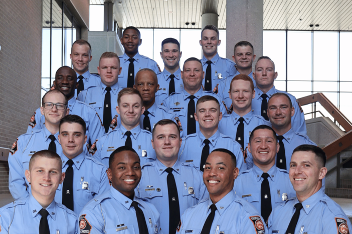 Group of smiling DPS officers